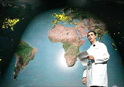  Larry Page walks by a map of the world during keynote speech at the Consumer Electronics Show in Las Vegas.